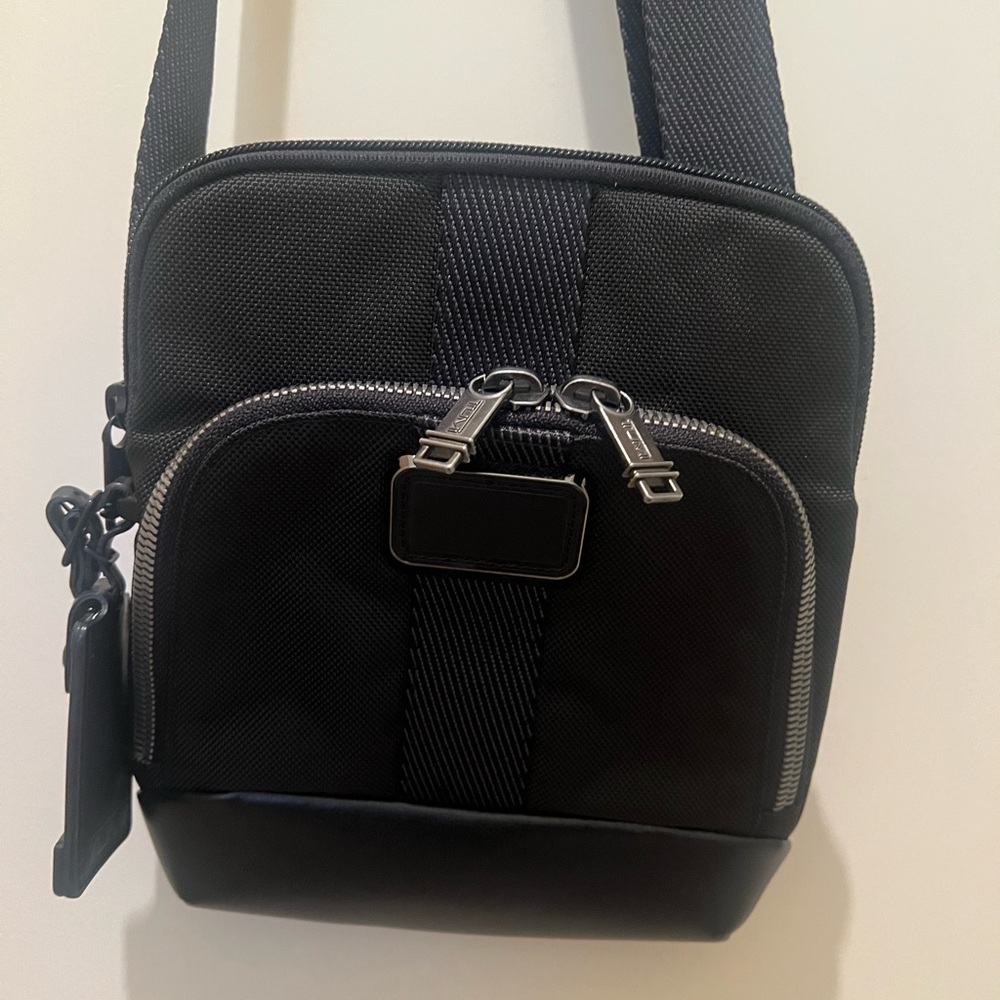 Tumi Black Messenger Bag with Silver Accents
